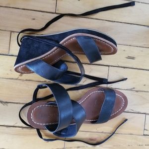 Never warn Bernado wedge sandals